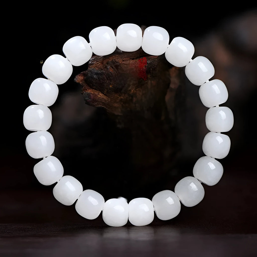 White Hetian jade barrel bead bracelet for men and women shown in three bead size options.