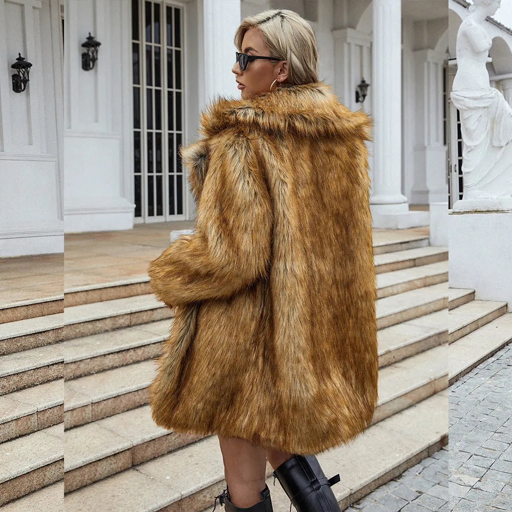 Yellow women's faux fur coat with a loose fit and mid-length silhouette.