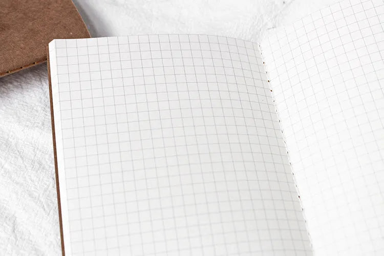 Cowhide diary refill insert showing dot grid and ruled pages with 11x21cm dimensions