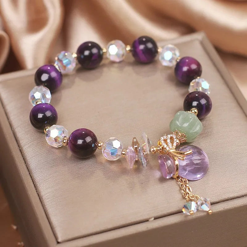 Women's purple tigereye crystal bracelet with money bag pendant and rhinestone decoration in forest style design