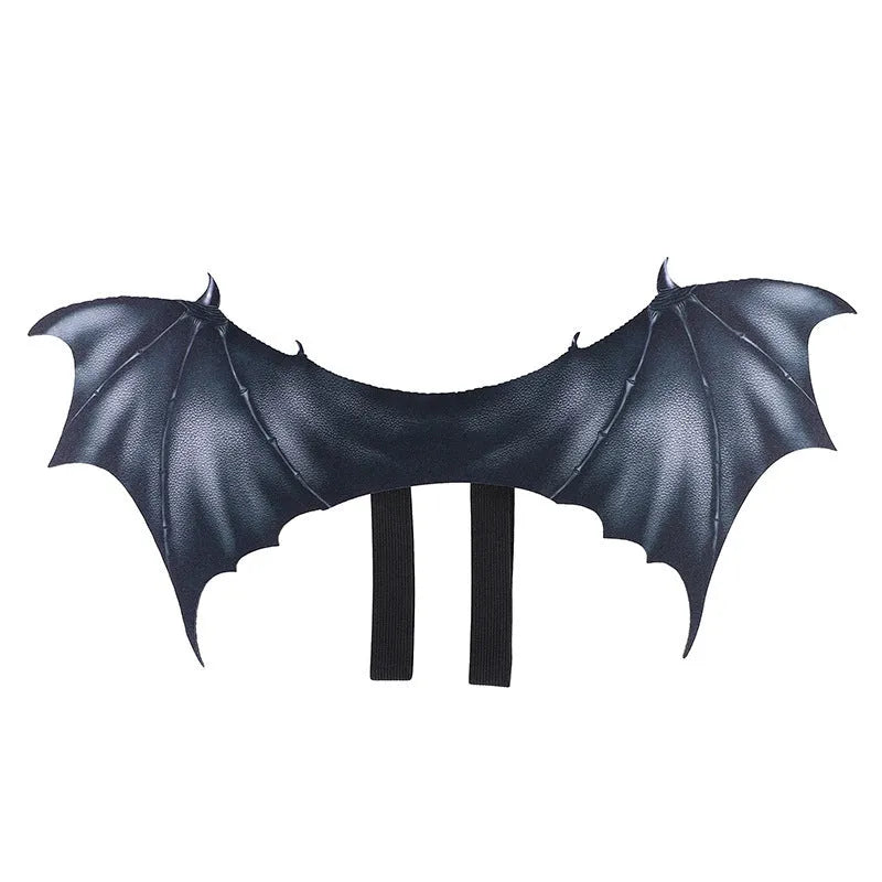 Black bat wing costume for a dog or cat on a Halloween background.