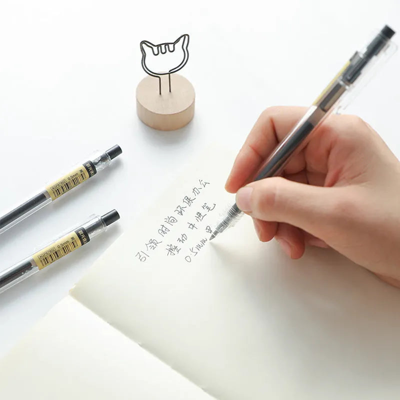 Set of twelve black retractable gel pens with frosted barrels and 0.5mm tips, plus two spare refills