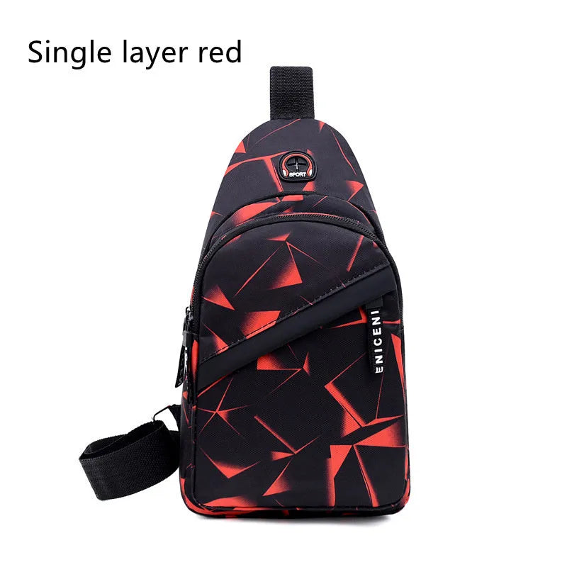 Blue men's crossbody sling bag with earphone hole, made from Oxford cloth, showing front zipper and strap.