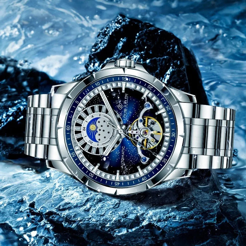 Men's automatic mechanical watch with silver case, blue dial, and stainless steel bracelet.