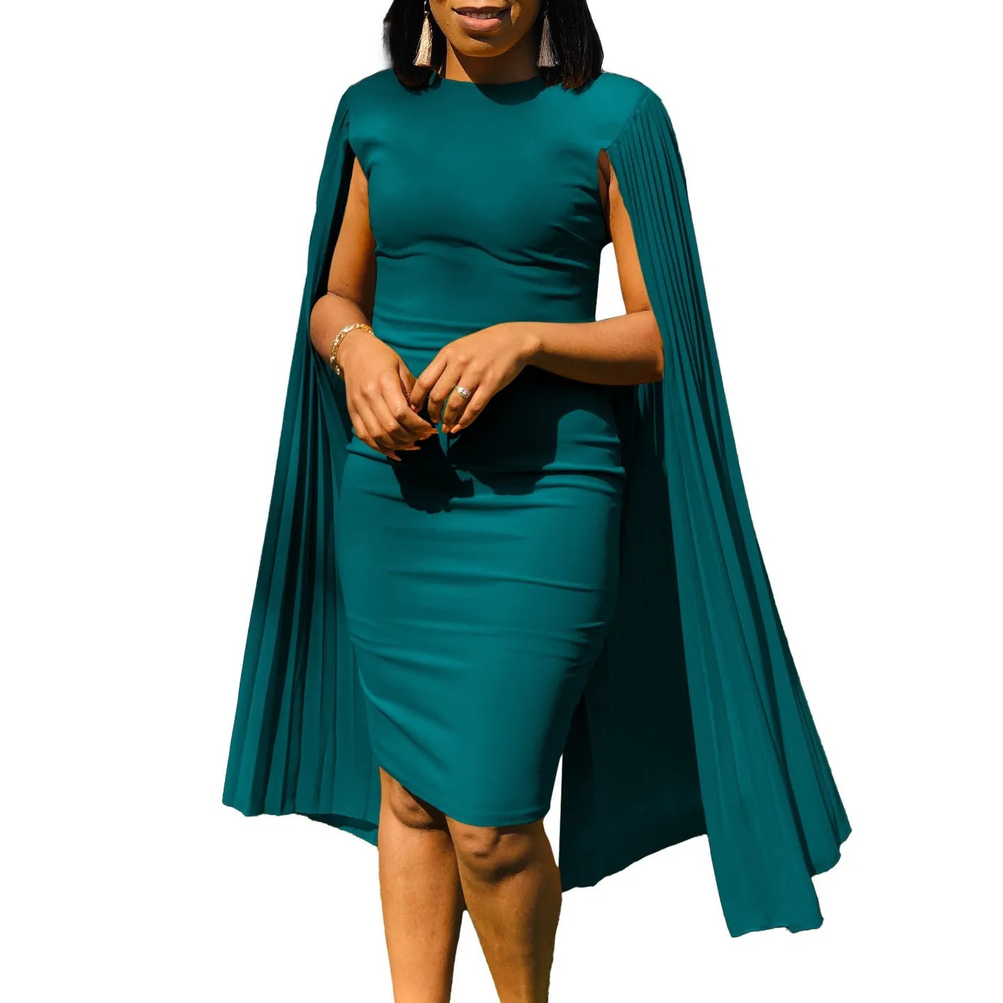 Woman wearing a long sleeve, floor-length evening gown with a pleated shawl detail at the neck and a high waist.