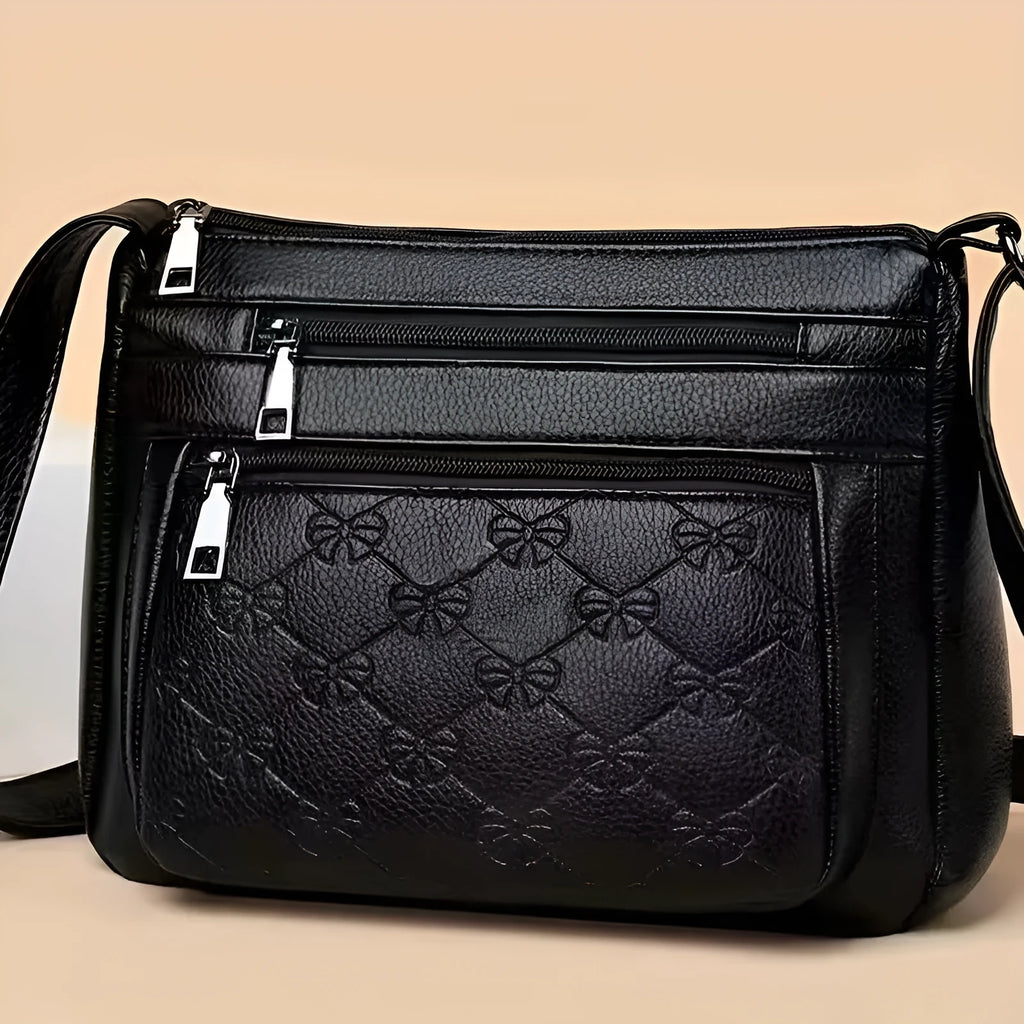 Butterfly Black women's PU shoulder messenger bag with crossbody strap and embossed details.