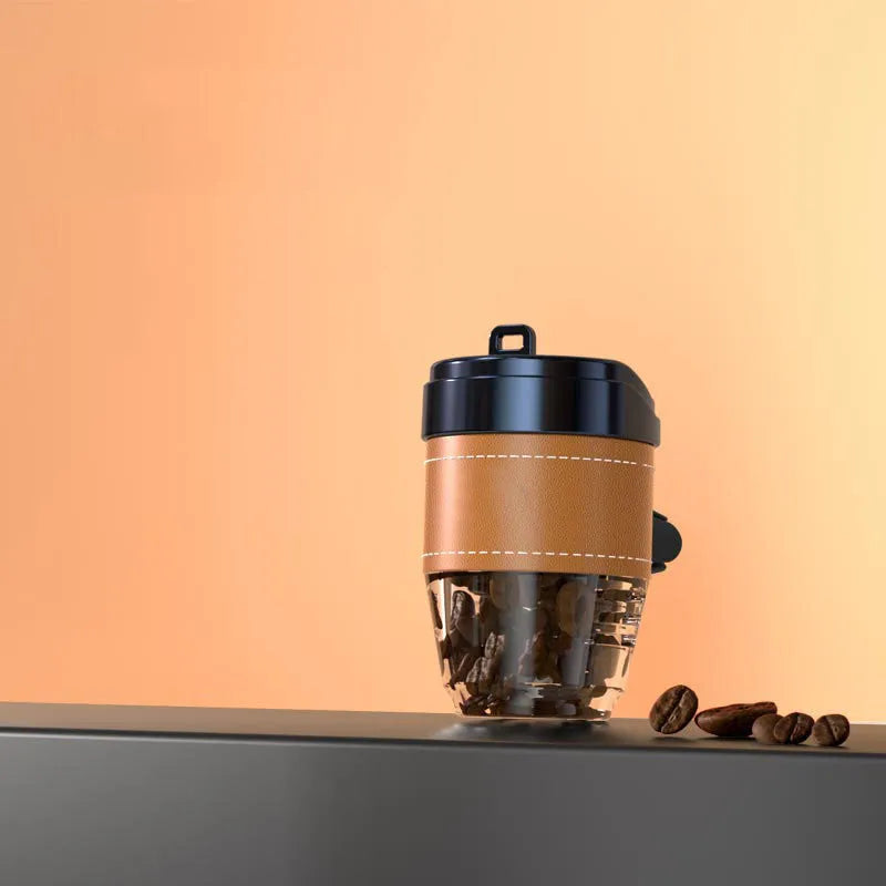Coffee cup shaped solid car air freshener in black, brown, white, orange, or green.