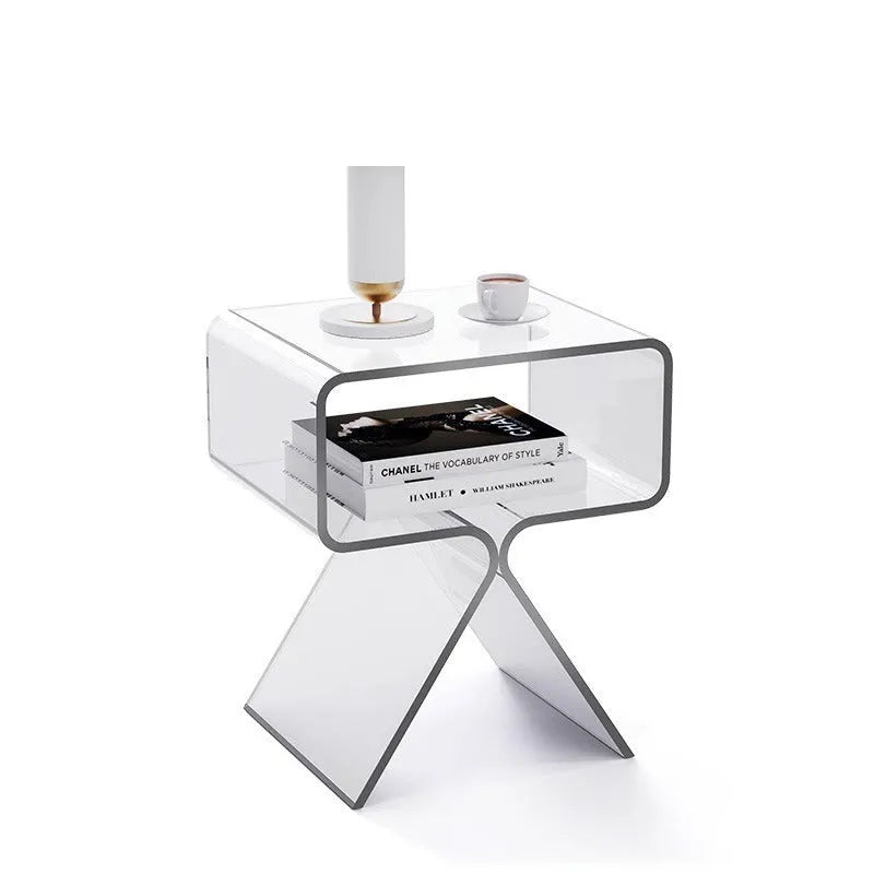 Transparent acrylic side table with bracket frame in living room setting