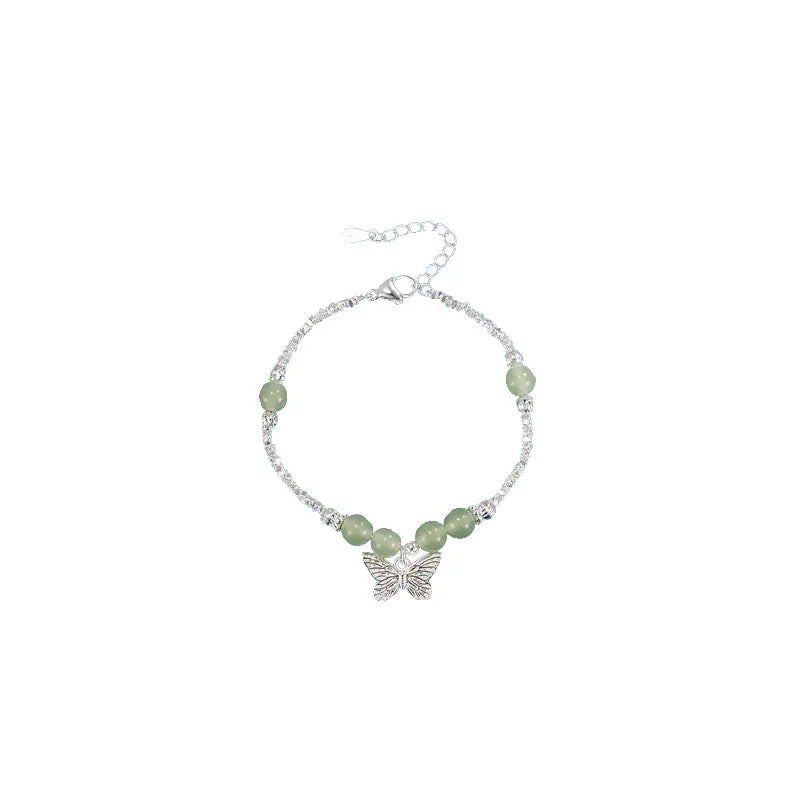 Copper bracelet and necklace set with silver electroplating and butterfly designs featuring Hetian jade accents
