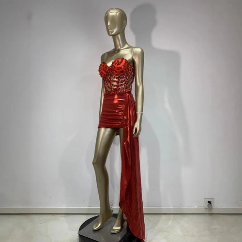 Red two-piece stage costume skirt suit with see-through mesh panels and a form-fitting spandex design.