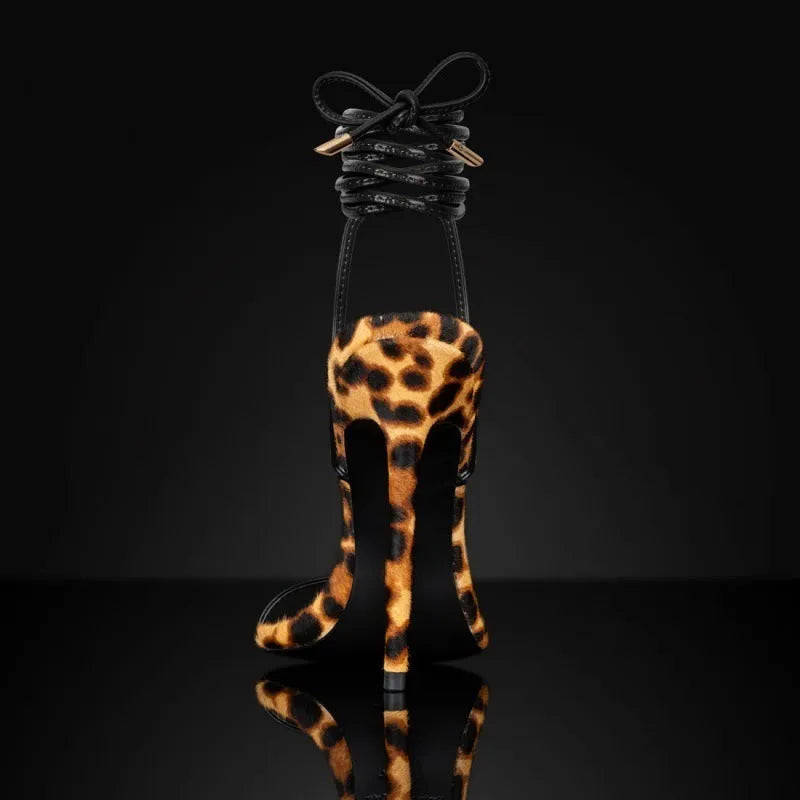 Women's leopard print Roman sandals with pointed toe design and lace-up buckle closure