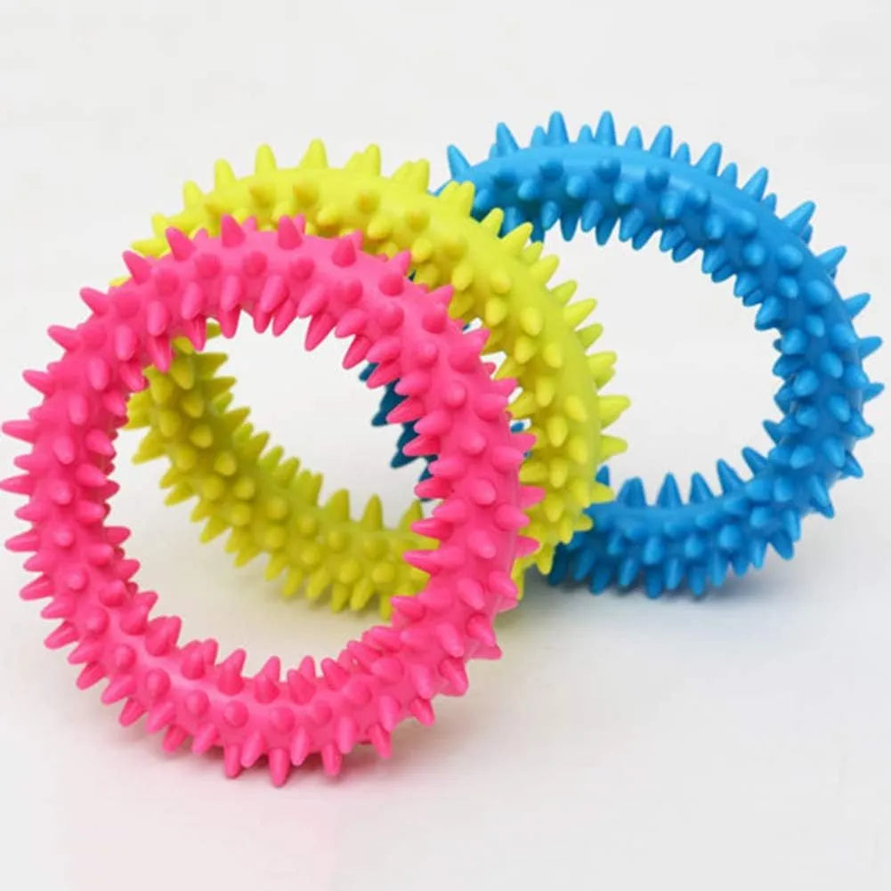 Blue TPR spiky ring dog chew toy for dental care and bite training, 9.5cm diameter.