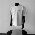 Men's white cotton short sleeve T-shirt with black printed letters design and loose fit