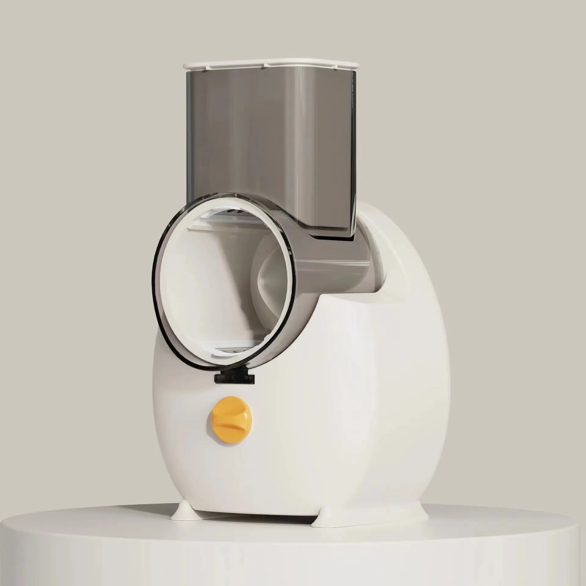 White electric vegetable slicer with rotary grater, suction base, and multiple blades on a kitchen counter.