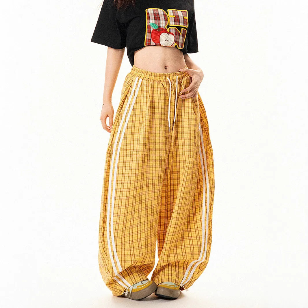 Loose straight drooping wide leg polyester trousers for women with side pockets, available in blue and yellow, sizes S to XXL