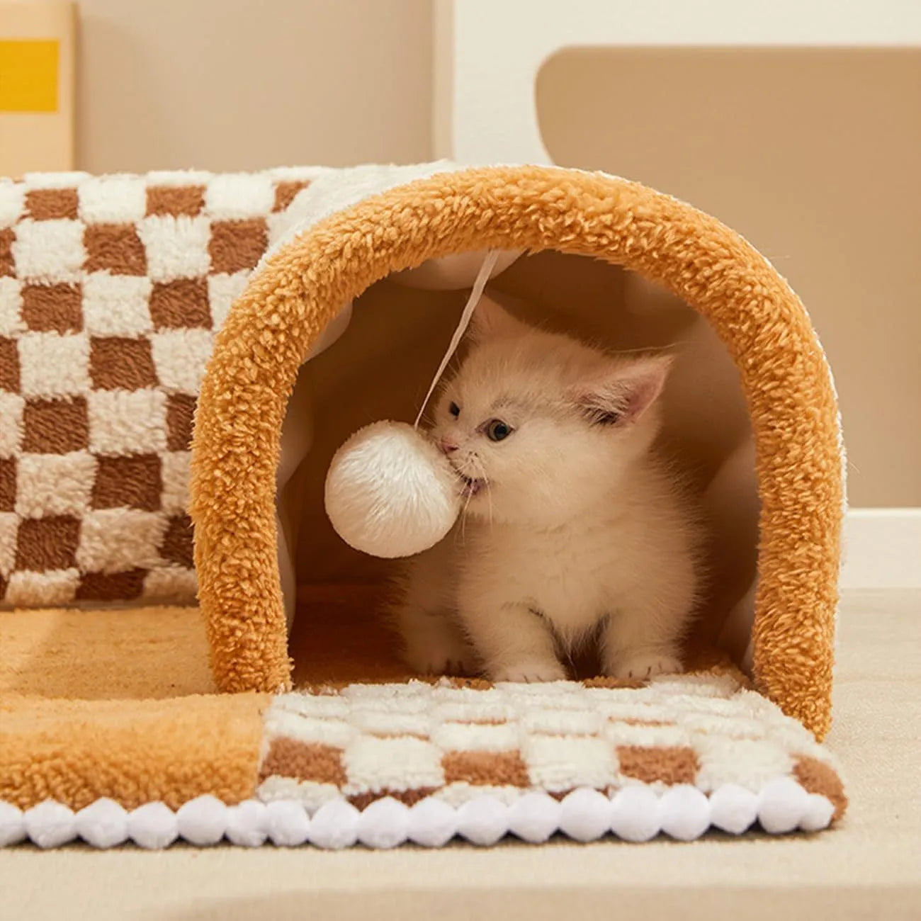 XL plush dog and cat bed with an attached tunnel in a plaid design, showing coffee colour and granular anti-slip bottom.