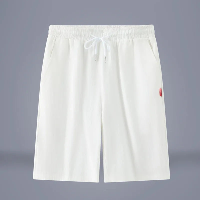 Chinese style solid colour cropped summer pants on a hanger.