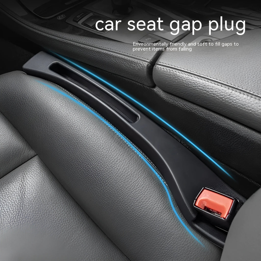 Black plastic car seat gap storage organiser box with handle inserted between vehicle seats