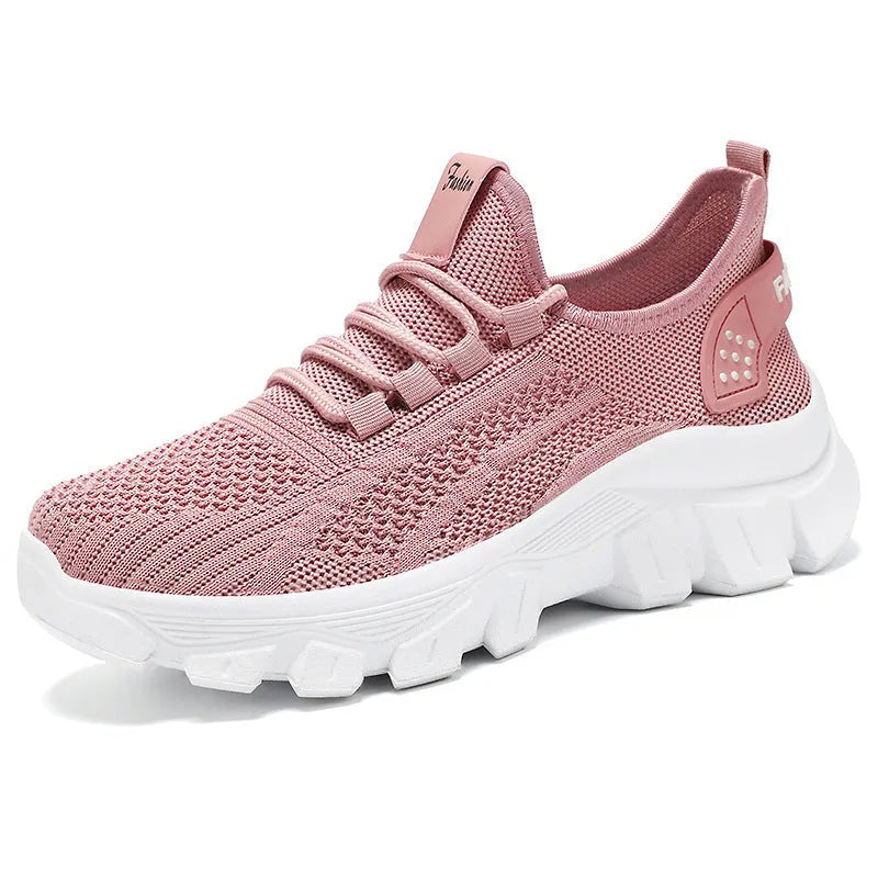 Men's white Flyknit tennis shoes with thick PVC sole and lace-up front