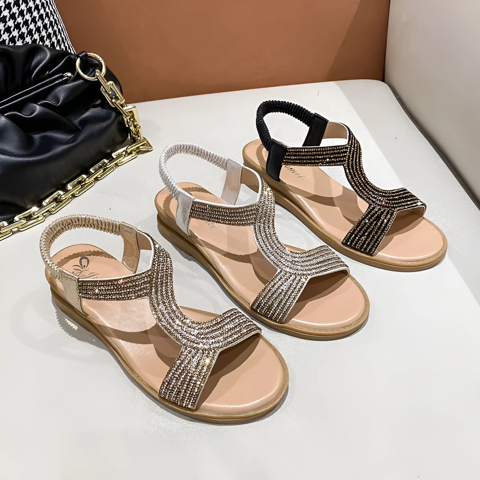 Women's patent leather summer sandals with rhinestone details and round toe design in black colour