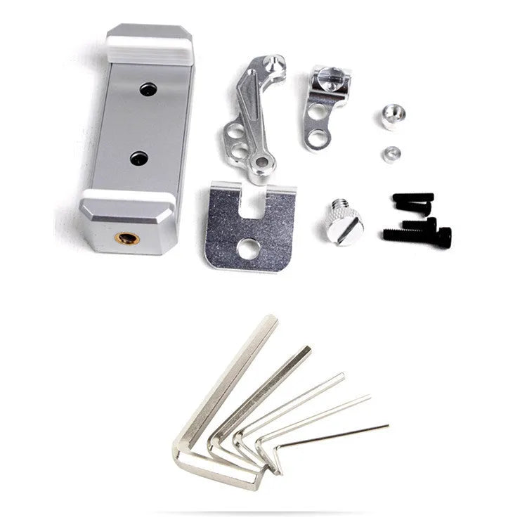 Silver mobile phone holder tongs with a remote control lanyard, a car accessory for elderly users.