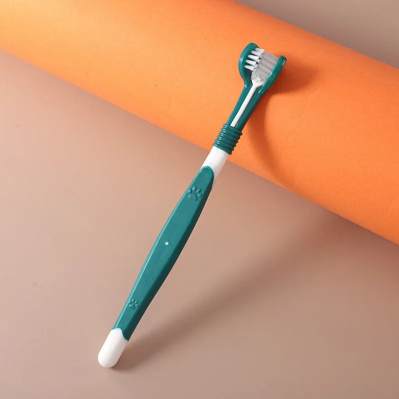 Pet toothbrush with soft nylon bristles on a plastic handle in various colour options for dogs and cats