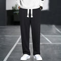 Men's grey Ninth Sports Pants showing high waist and multiple pockets.