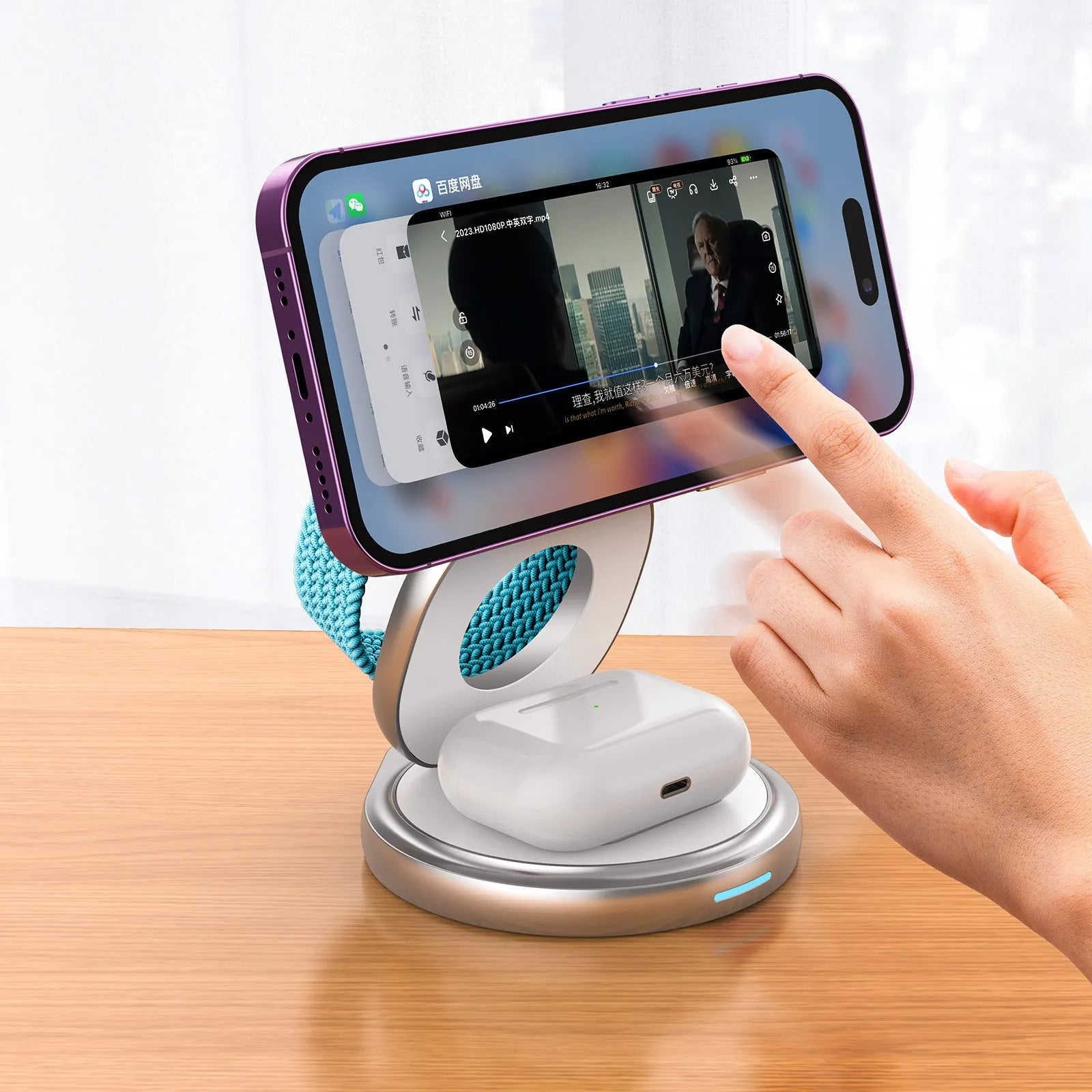 3-in-1 magnetic folding wireless charger stand in grey, with phone and headphones on a desk