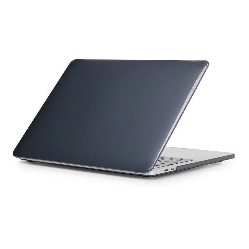 Transparent and black PC hard shell protective cases for Apple MacBook Pro 14-inch and 16-inch laptops.