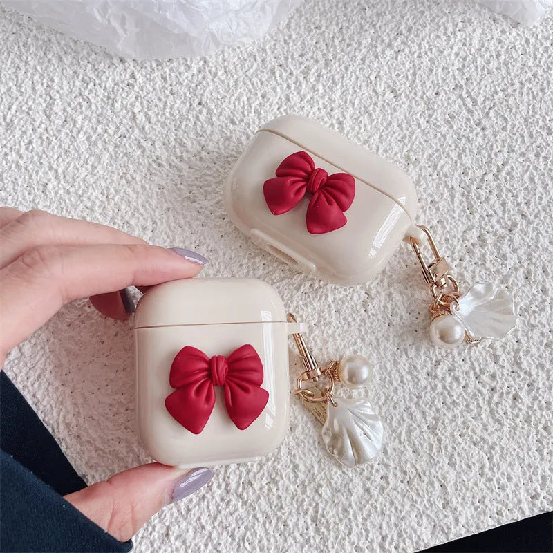Beige red bow shell TPU clamshell case for AirPods Pro, AirPods 3, AirPods 1 and AirPods 2 wireless earphones
