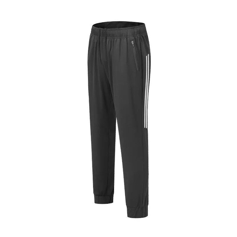 Men's black breathable polyester running trousers with a mid-waist design.