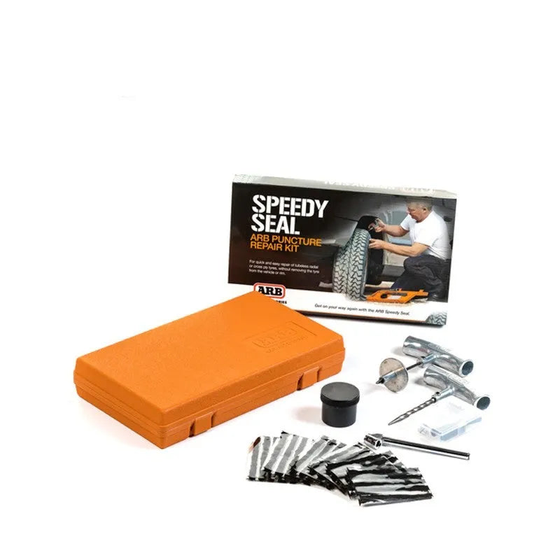 Open case showing emergency car tyre repair tool set with pressure gauge, pliers, and insertion tools.