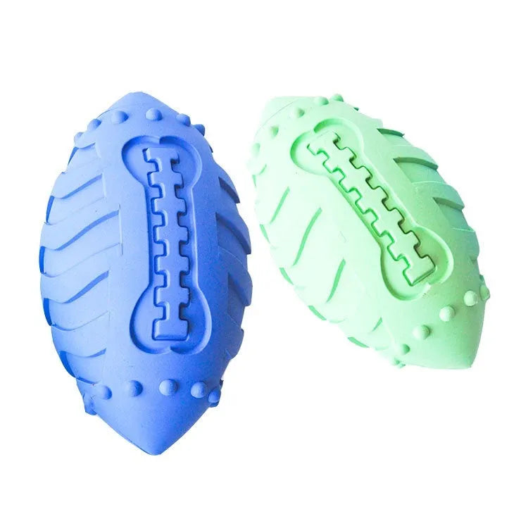 Sapphire blue rubber dog training ball with rugby shape for interactive play and teeth cleaning