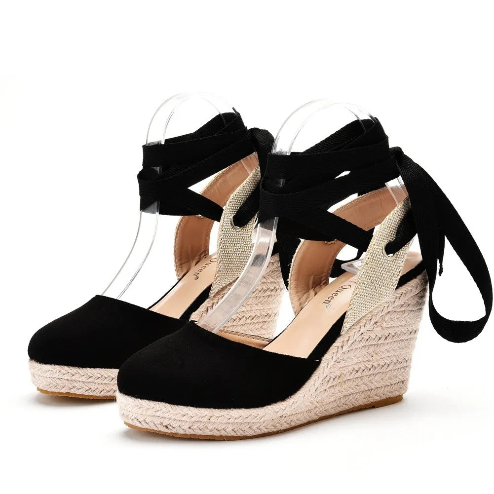Women's bohemian platform wedge sandals with round toe, adjustable buckle, and tassel decoration