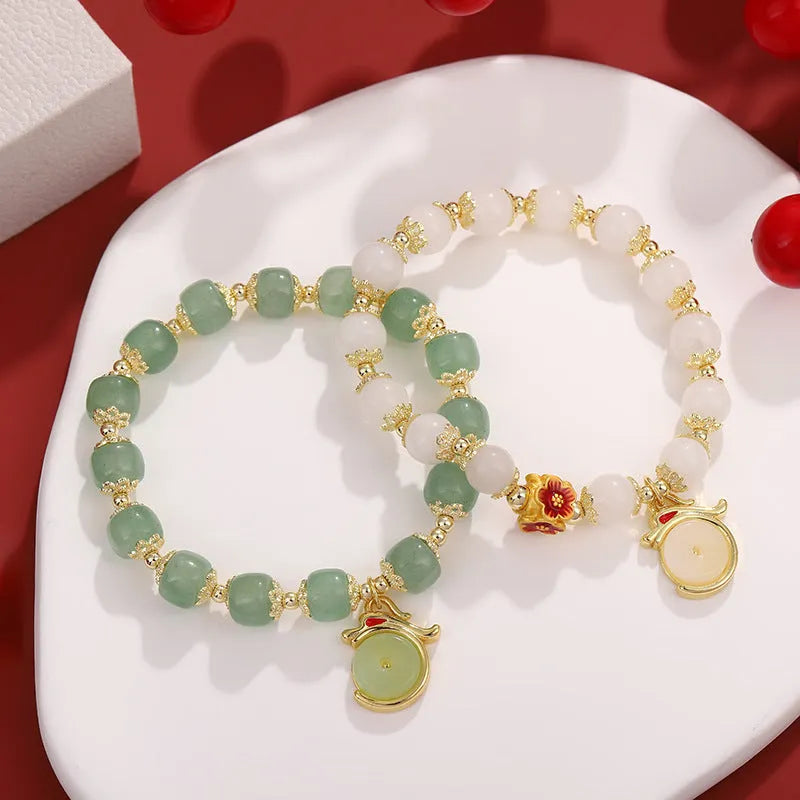Chinese style natural stone beads bracelet with lucky coin and agate beads on white background