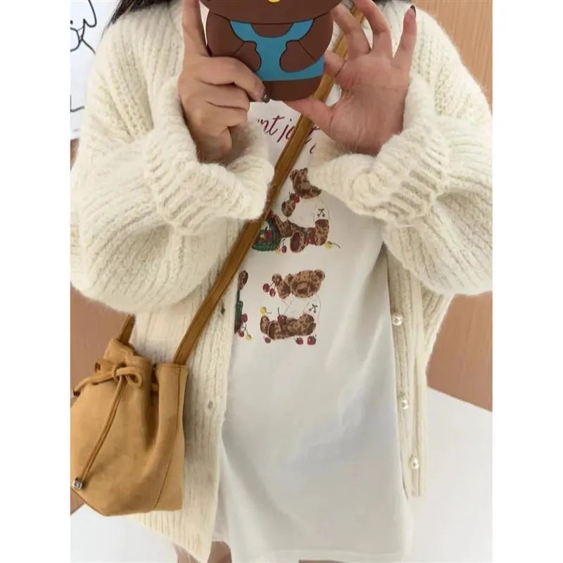 Brown suede crossbody shoulder bag with visible sewing line detail, retro style
