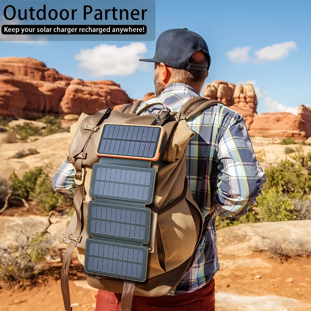 Black outdoor solar power bank with a solar panel, LED light, and soft leather texture, shown with a charging cable.