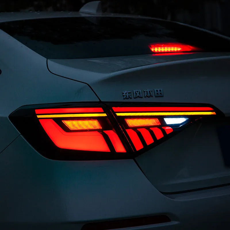 11th generation Honda Civic modified LED taillight assembly in black and red housing.