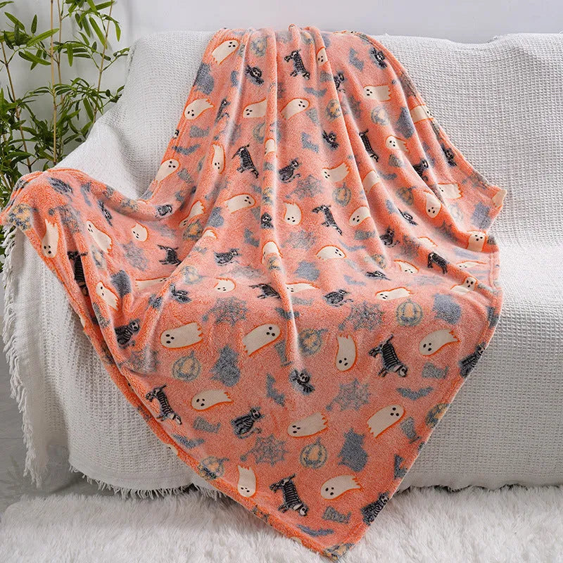 Cartoon-patterned flannel blanket draped over a child's air conditioning unit.