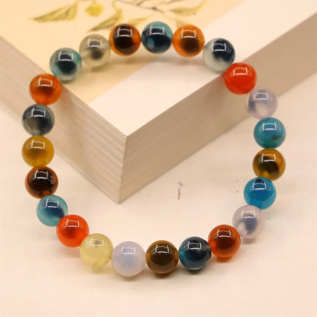 Women's natural agate snake bracelet with copper coin and coloured glaze decoration in choice of symbolic patterns