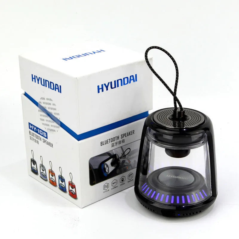 Portable mini Bluetooth speaker in black or white with 5W output, 850 mAh battery and waterproof anti-fall design.