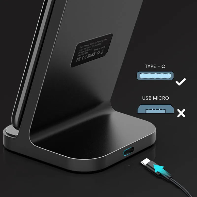 Dark grey vertical wireless charging stand for Apple iPhones on a desk