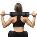 Red foam barbell pad cover for squats, 45cm length, with straps, on a barbell