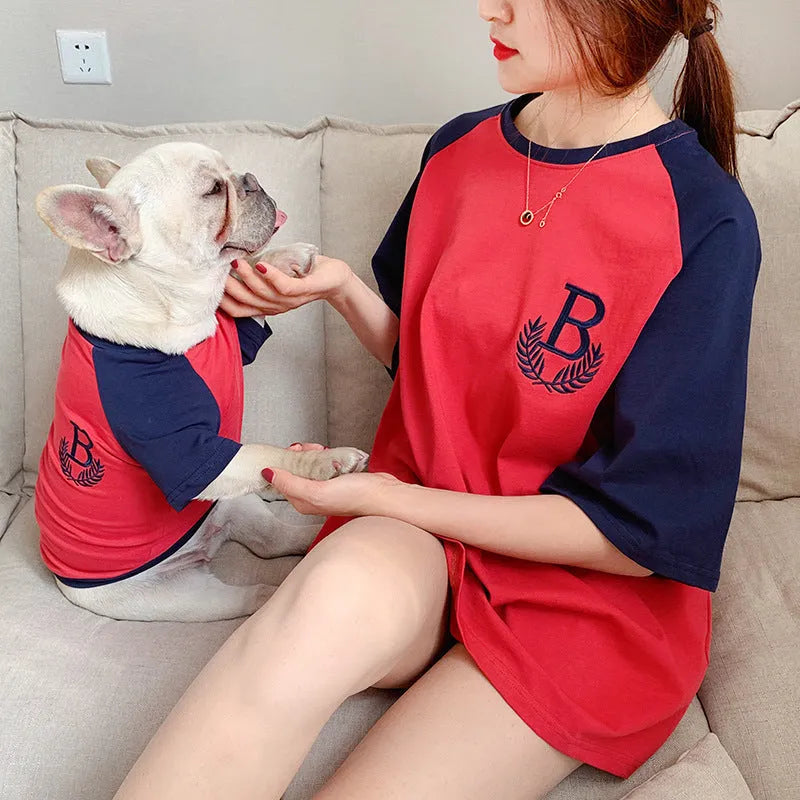 Dog wearing a short sleeve casual top in double yarn stretch Odell fabric, colour Blue