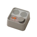 Mini retro Bluetooth speaker in Milk White with compact design, 105mm x 105mm x 50mm