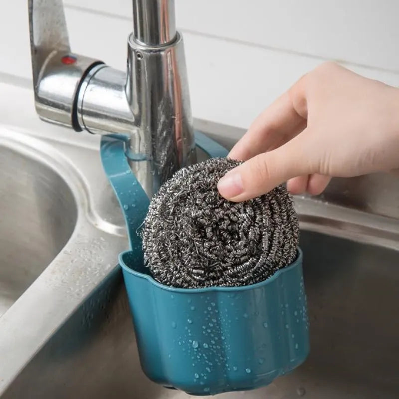 Plastic kitchen sink drain basket in dark blue colour showing Nordic style design.