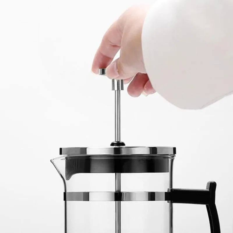 Compact manual pour-over coffee maker with glass and stainless steel construction, showing 350ml capacity