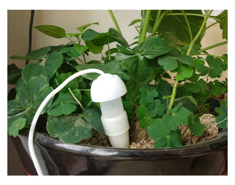 White ceramic and PP self-watering seepage device with 78cm pipe, 11cm height, 3cm diameter for potted plants