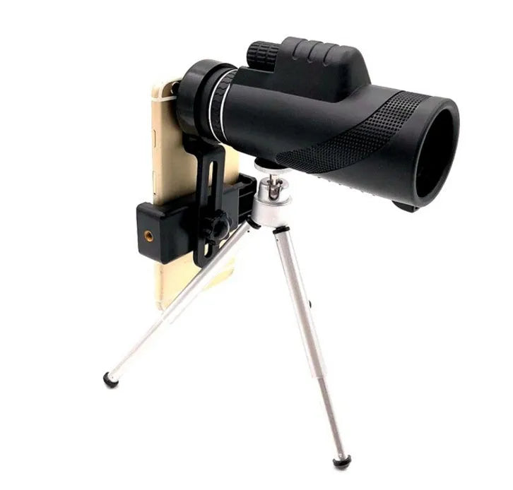 Black 40x60 smartphone monocular telescope with 144mm length on a table.