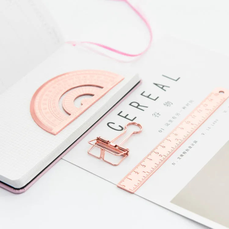 Stainless steel office ruler set with protractor, triangle plate, and 165mm ruler in rose gold finish, transparent sealing pocket